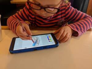 My niece enjoying the PENUP app